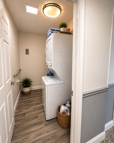 On-site laundry room with washer and dryer
